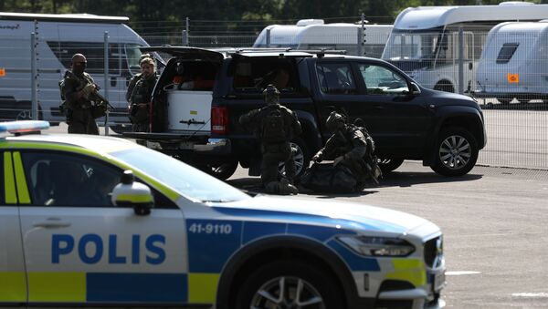 A police vehicle is seen at Hallby Prison, outside Eskilstuna, Sweden July 21, 2021. - Sputnik International