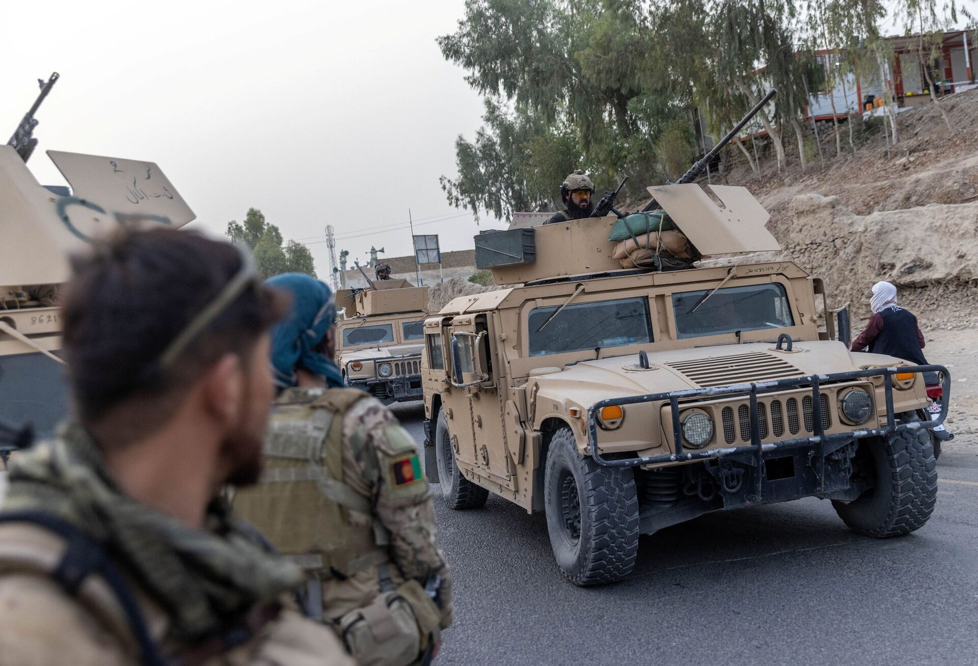 A convoy of Afghan Special Forces is seen during the rescue mission of a police officer besieged at a check post surrounded by Taliban, in Kandahar province, Afghanistan, July 13, 2021. REUTERS/Danish Siddiqui - Sputnik International, 1920, 07.09.2021