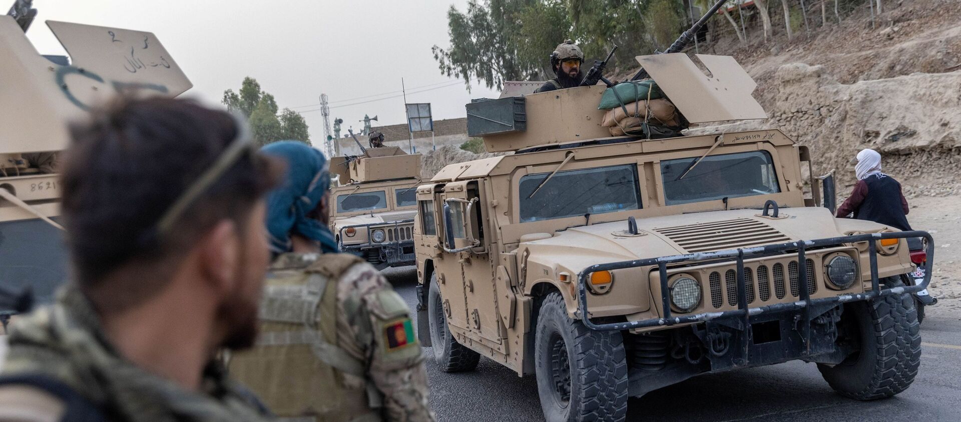 A convoy of Afghan Special Forces is seen during the rescue mission of a police officer besieged at a check post surrounded by Taliban, in Kandahar province, Afghanistan, July 13, 2021. REUTERS/Danish Siddiqui - Sputnik International, 1920