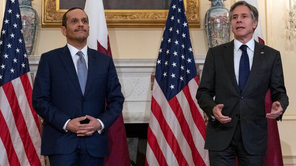U.S. Secretary of State Antony Blinkin speaks next to  Qatar's Foreign Minister Mohammed bin Abdulrahman bin Jassim Al Thani at Department of State in Washington, D.C., U.S., July 22, 2021. - Sputnik International
