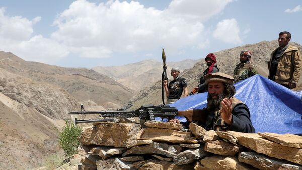 Armed men who are against the Taliban uprising stand at their check post, at the Ghorband District, Parwan Province, Afghanistan, 29 June 2021. - Sputnik International