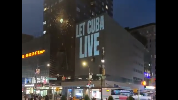 A projection in Times Square on 22 July 2021, organised by The People's Forum in New York in conjunction with the publication of a letter calling for US President Joe Biden to drop the 243 sanctions on Cuba introduced by Donald Trump. - Sputnik International