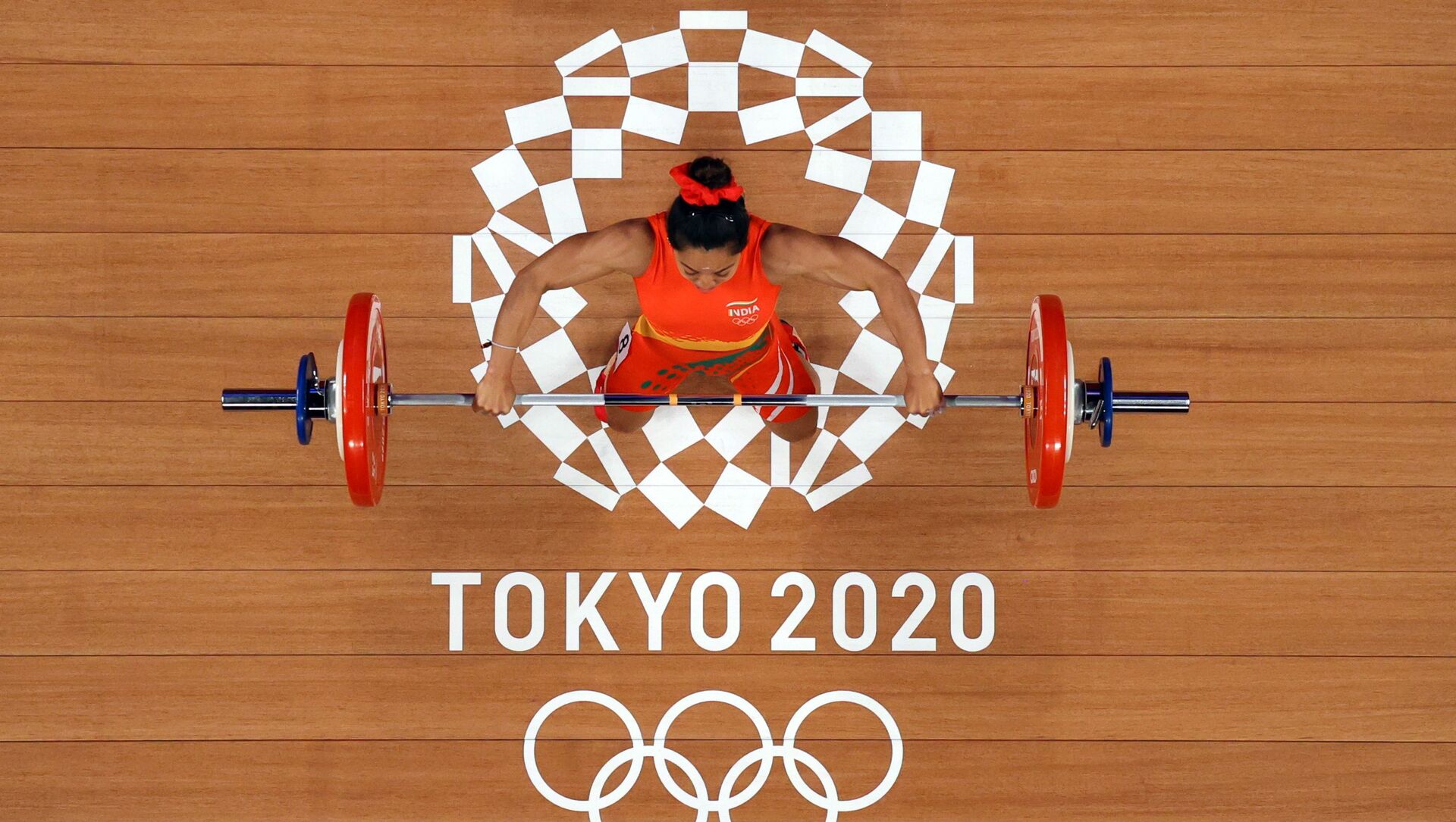 Tokyo 2020 Olympics - Weightlifting - Women's 49kg - Group A - Tokyo International Forum, Tokyo, Japan - July 24, 2021.  Mirabai Chanu Saikhom of India in action. Pool via REUTERS/Chris Graythen - Sputnik International, 1920, 24.07.2021