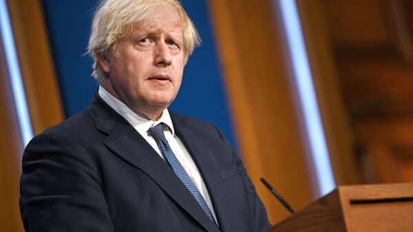 Britain's Prime Minister Boris Johnson holds a news conference in London - Sputnik International