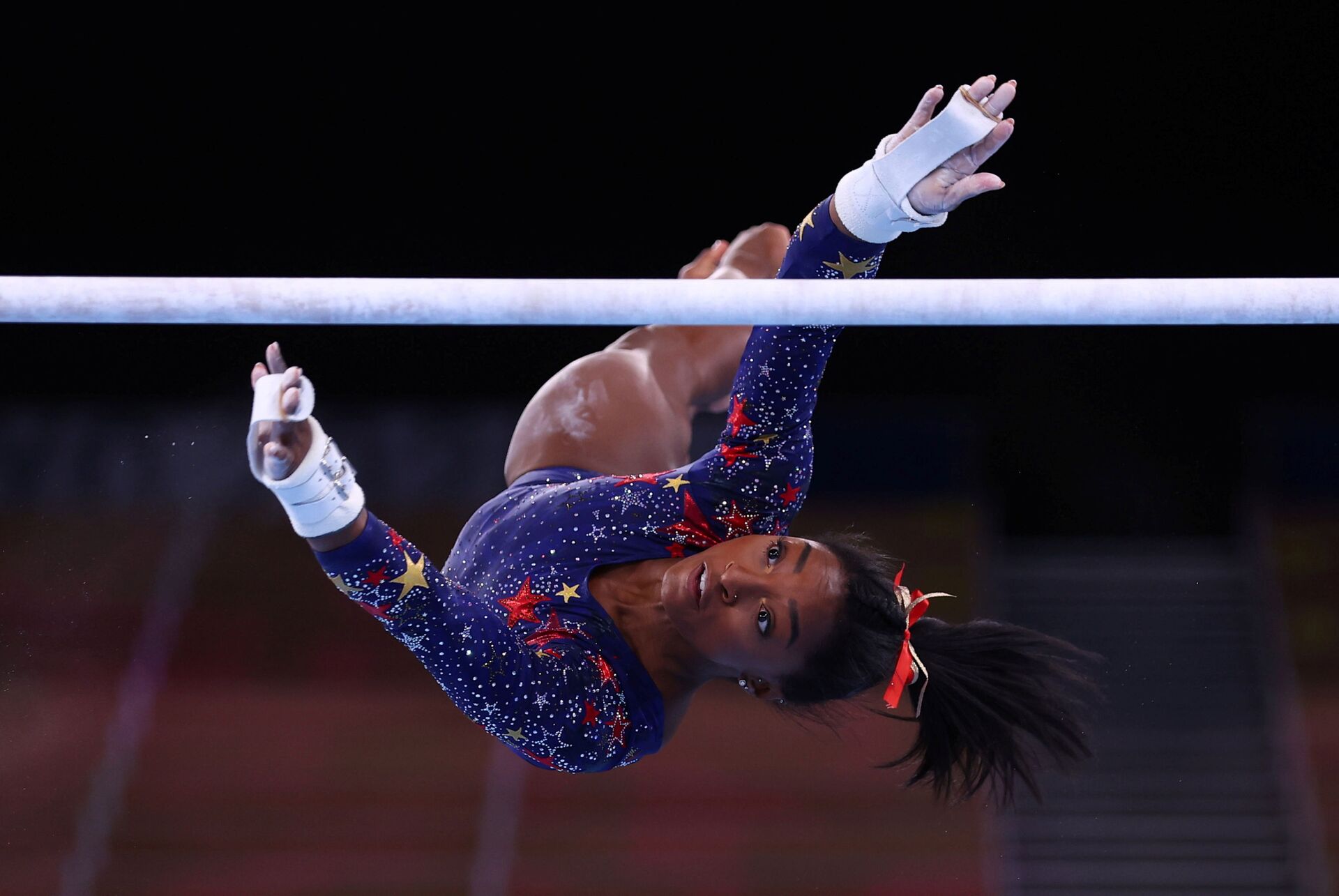 Tokyo 2020 Olympics - Gymnastics - Artistic - Women's Uneven Bars - Qualification - Ariake Gymnastics Centre, Tokyo, Japan - July 25, 2021. Simone Biles of the United States in action during the uneven bars REUTERS/Mike Blake/File photo  SEARCH OLYMPICS DAY 3 FOR TOKYO 2020 OLYMPICS EDITOR'S CHOICE, SEARCH REUTERS OLYMPICS TOPIX FOR ALL EDITOR'S CHOICE PICTURES. - Sputnik International, 1920, 07.09.2021