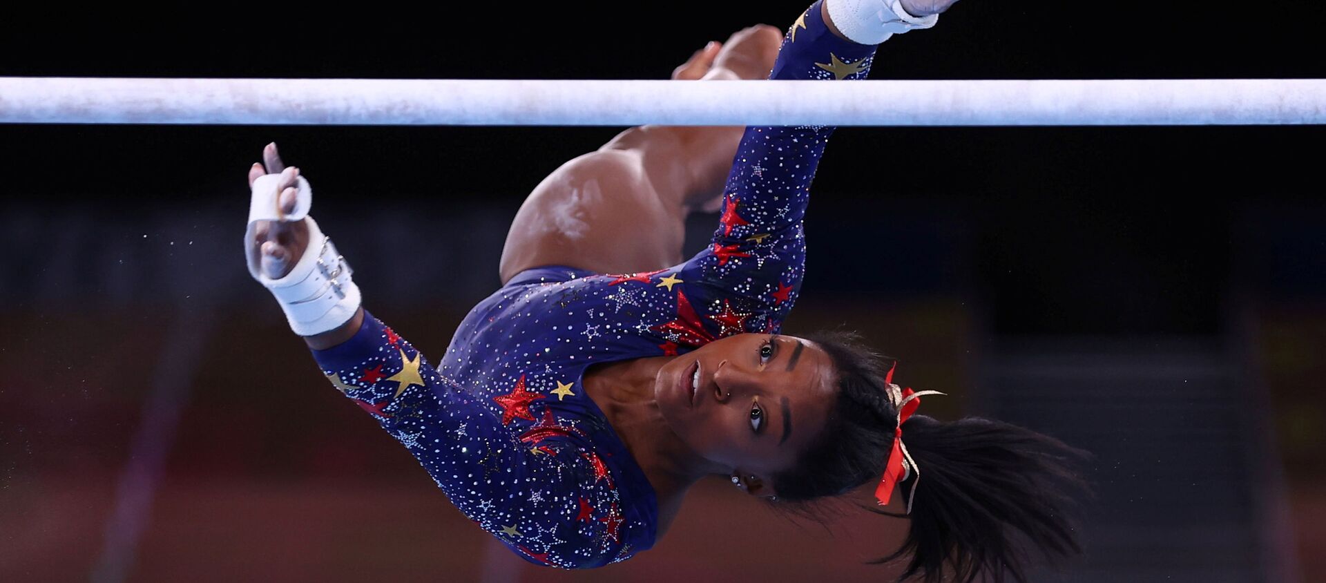 Tokyo 2020 Olympics - Gymnastics - Artistic - Women's Uneven Bars - Qualification - Ariake Gymnastics Centre, Tokyo, Japan - July 25, 2021. Simone Biles of the United States in action during the uneven bars REUTERS/Mike Blake/File photo  SEARCH OLYMPICS DAY 3 FOR TOKYO 2020 OLYMPICS EDITOR'S CHOICE, SEARCH REUTERS OLYMPICS TOPIX FOR ALL EDITOR'S CHOICE PICTURES. - Sputnik International, 1920