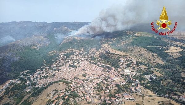 An aerial view from a helicopter shows a large wildfire that broke out near Santu Lussurgiu, Sardinia, Italy July 25, 2021. - Sputnik International