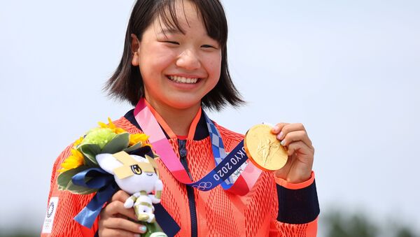 Tokyo 2020 Olympics - Skateboarding - Women's Street - Medal Ceremony - Ariake Urban Sports Park - Tokyo, Japan - July 26, 2021. Momiji Nishiya of Japan poses with her gold medal during medal ceremony.  - Sputnik International