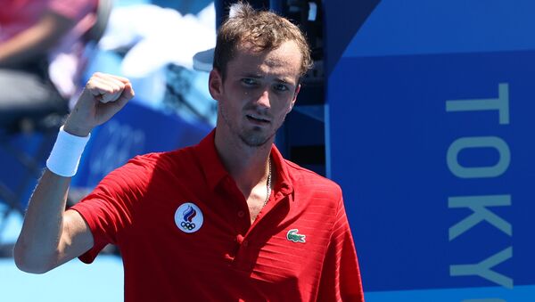 Tokyo 2020 Olympics - Tennis - Men's Singles - Round 3 - Ariake Tennis Park - Tokyo, Japan - July 28, 2021. Daniil Medvedev of the Russian Olympic Committee celebrates after winning his third round match against Fabio Fognini of Italy  - Sputnik International