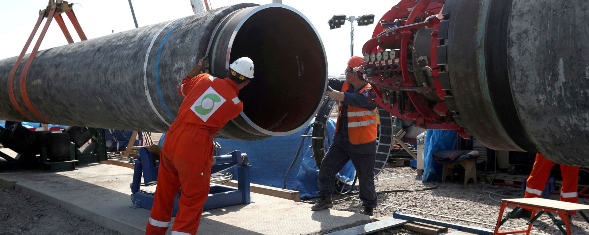 FILE PHOTO: Workers are seen at the construction site of the Nord Stream 2 gas pipeline, near the town of Kingisepp, Leningrad region, Russia, June 5, 2019 - Sputnik International, 1920, 06.10.2021