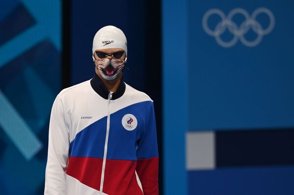 Russian athlete Evgeny Rylov preparing for the men's 100m backstroke race at the 2020 Summer Olympics in Tokyo, Japan. - Sputnik International