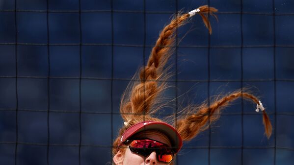 Kelly Claes of the US beach volleyball team during their match against Latvia at the Tokyo 2020 Olympics. - Sputnik International