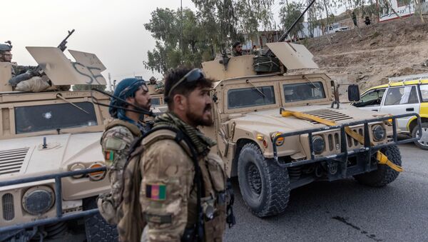 A convoy of Afghan Special Forces is seen during the rescue mission of a policeman besieged at a check post surrounded by Taliban, in Kandahar province, Afghanistan, July 13, 2021 - Sputnik International