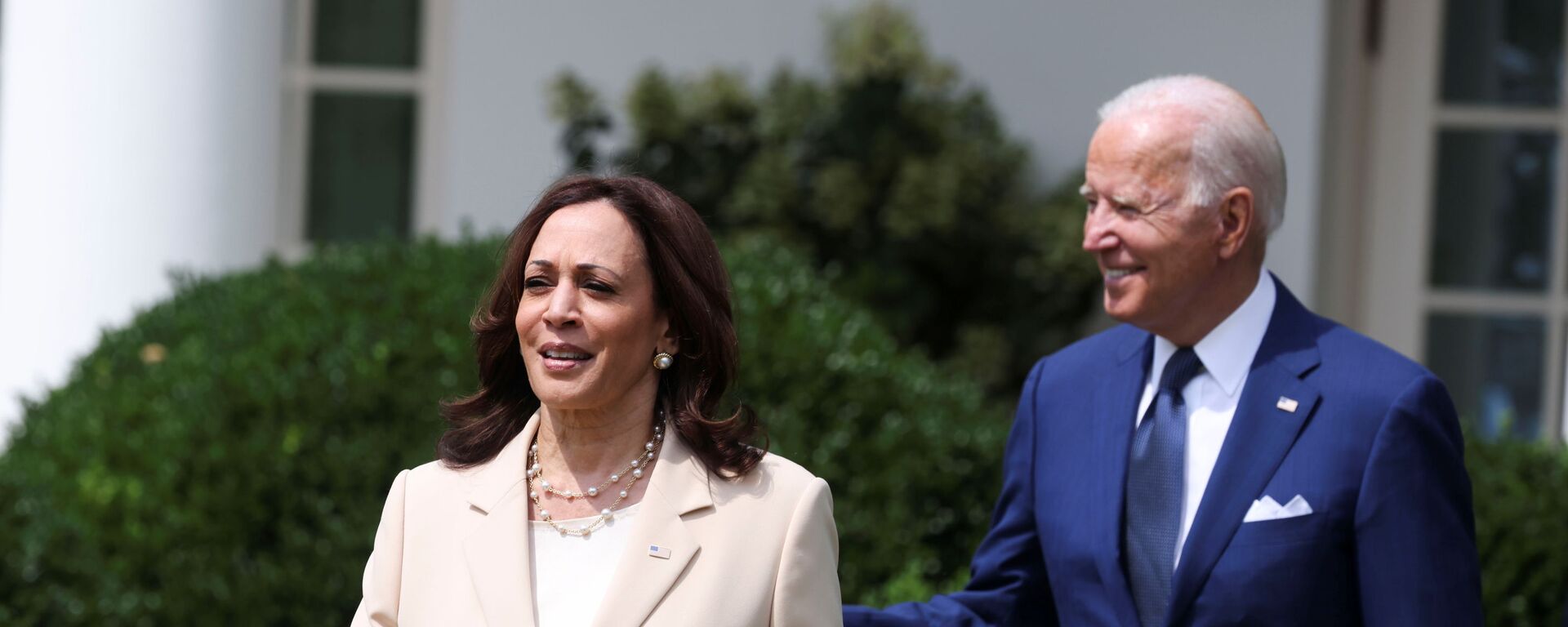 U.S. President Joe Biden and Vice President Kamala Harris arrive for an event to celebrate the 31st anniversary of the Americans with Disabilities Act (ADA) in the White House Rose Garden in Washington, U.S., July 26, 2021 - Sputnik International, 1920, 08.04.2022