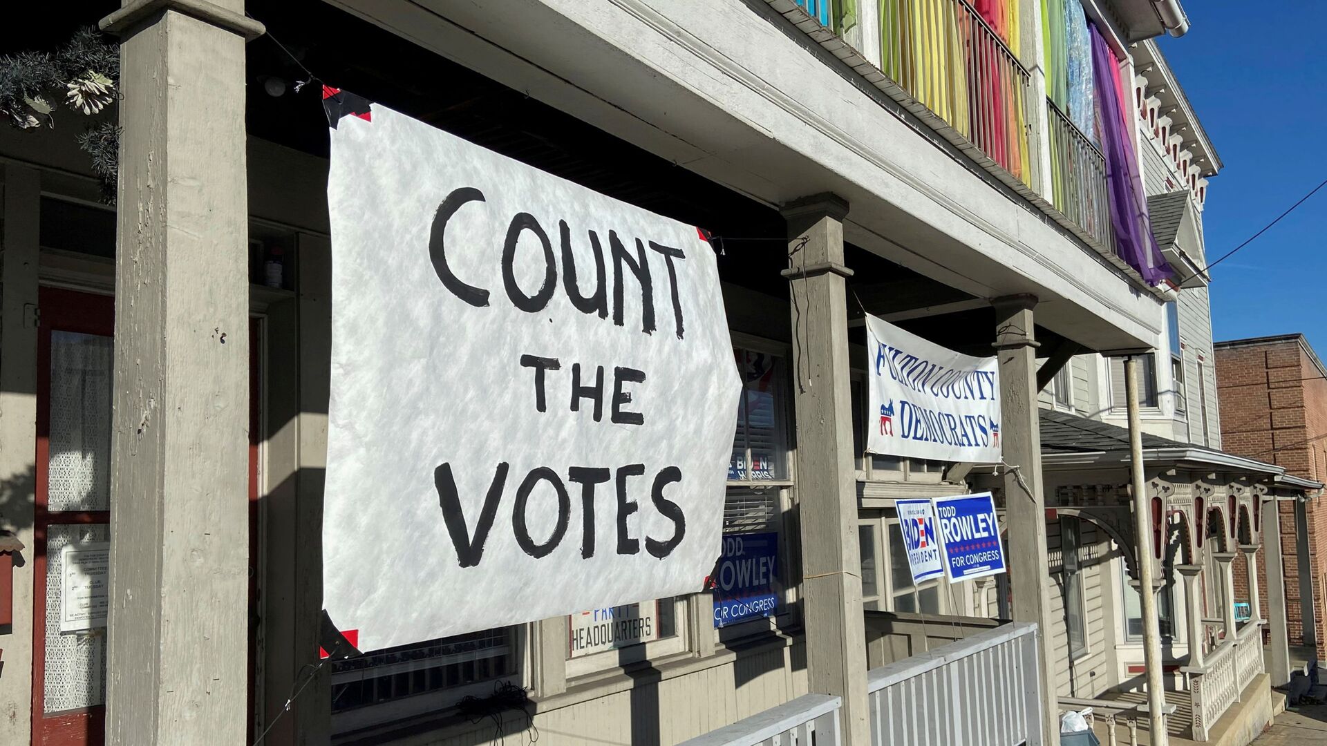 A sign urging people to vote is seen on the porch of the Democratic Party's Fulton County headquarters on Election Day in McConnellsburg, Pennsylvania November 3, 2020. Picture taken November 3, 2020. - Sputnik International, 1920, 25.08.2021