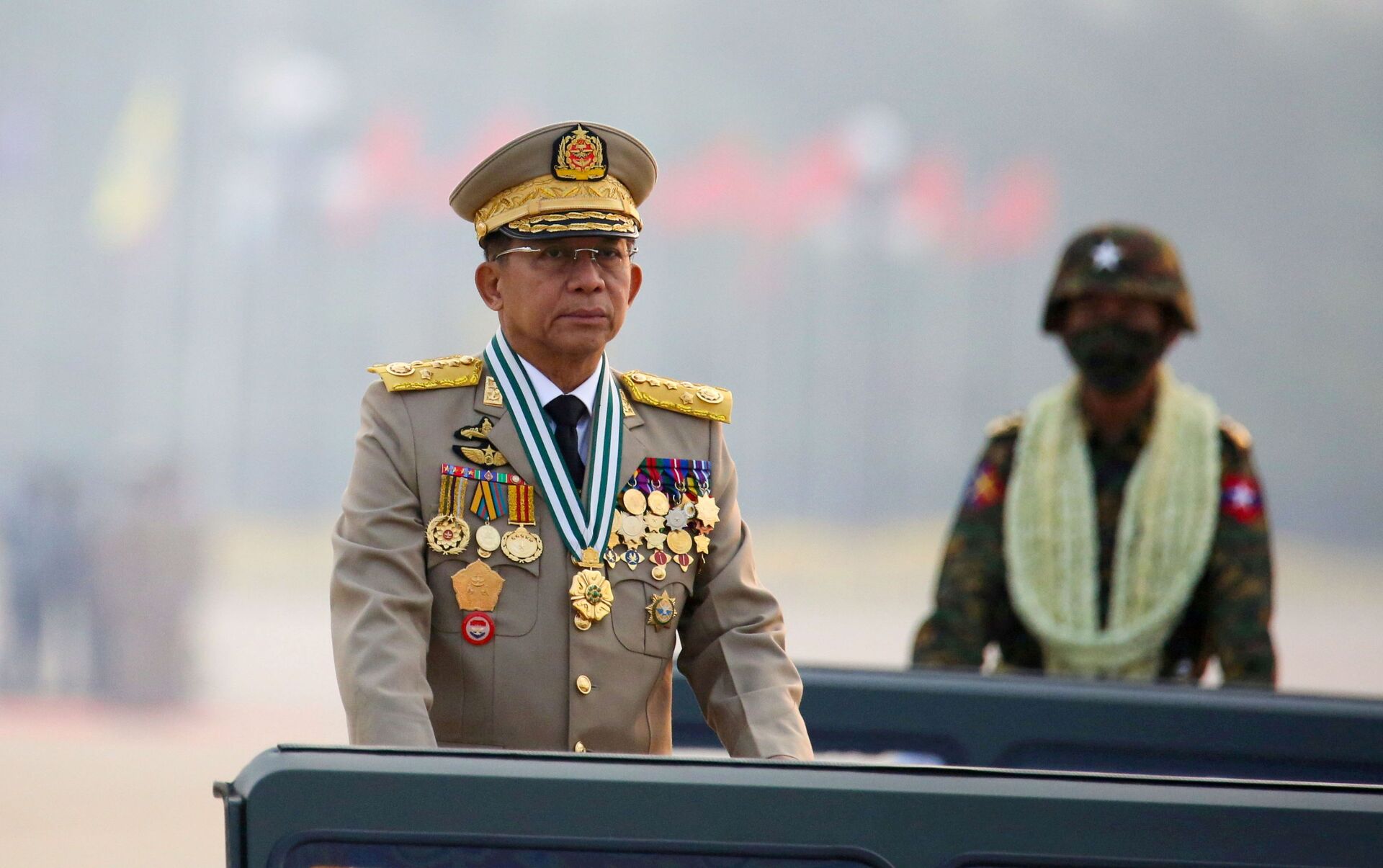 FILE PHOTO: Myanmar's military ruler Min Aung Hlaing presides over an army parade on Armed Forces Day in Naypyitaw, Myanmar, March 27, 2021. REUTERS/Stringer//File Photo - Sputnik International, 1920, 27.10.2021