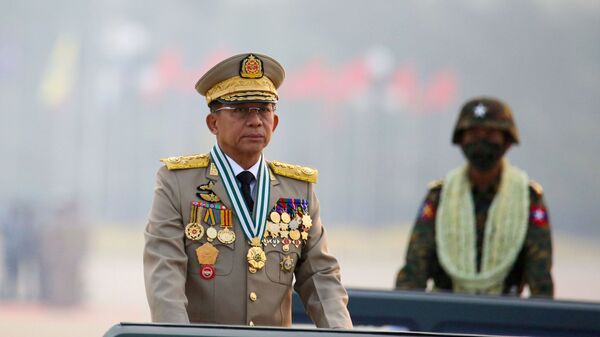 FILE PHOTO: Myanmar's military ruler Min Aung Hlaing presides over an army parade on Armed Forces Day in Naypyitaw, Myanmar, March 27, 2021. REUTERS/Stringer//File Photo - Sputnik International