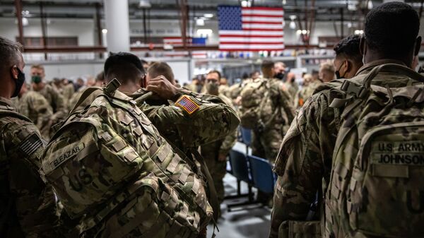 FORT DRUM, NEW YORK - DECEMBER 08: U.S. Army soldiers from the 10th Mountain Division arrive from a 9-month deployment in Afghanistan on December 08, 2020 in Fort Drum, New York. - Sputnik International