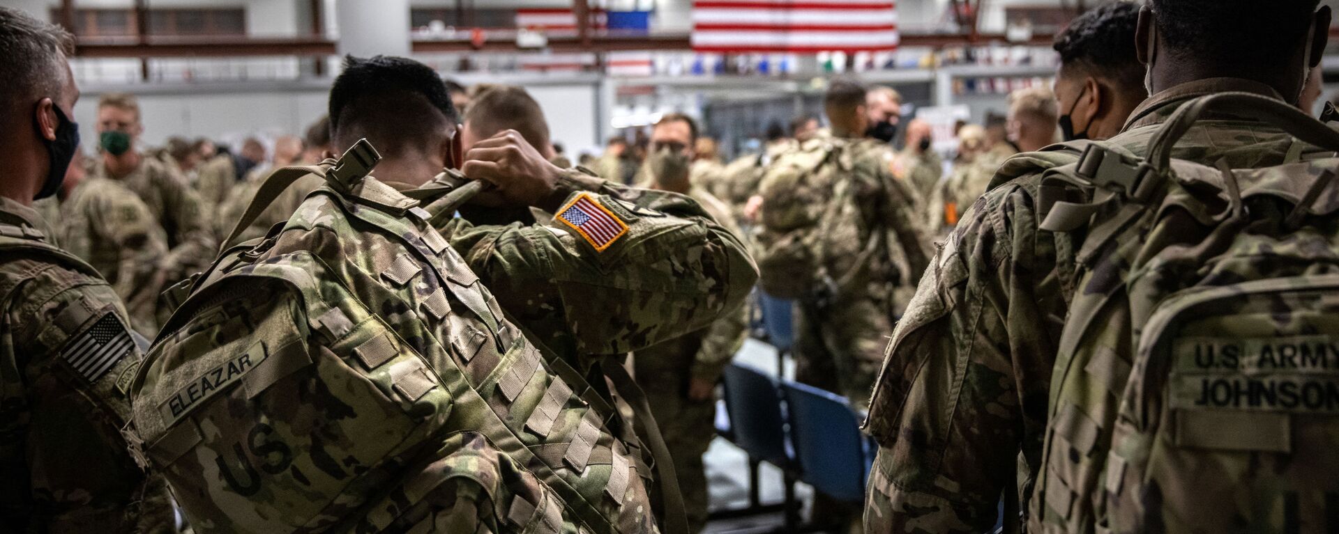 FORT DRUM, NEW YORK - DECEMBER 08: U.S. Army soldiers from the 10th Mountain Division arrive from a 9-month deployment in Afghanistan on December 08, 2020 in Fort Drum, New York. - Sputnik International, 1920, 14.08.2021