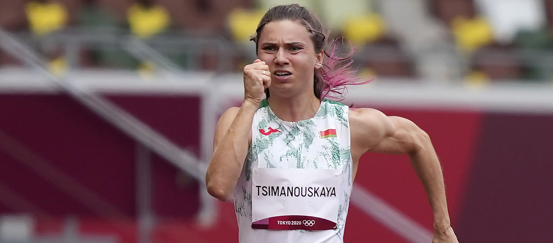 Kristina Timanovskaya, of Belarus, runs in the women's 100-meter run at the 2020 Summer Olympics, Friday, July 30, 2021.  - Sputnik International, 1920, 02.08.2021