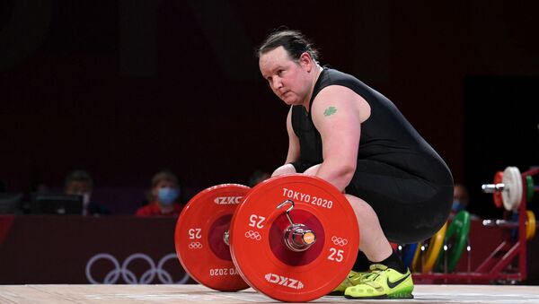 New Zealand's Laurel Hubbard reacts in the women's +87kg weightlifting competition during the Tokyo 2020 Olympic Games at the Tokyo International Forum in Tokyo on August 2, 2021.  - Sputnik International