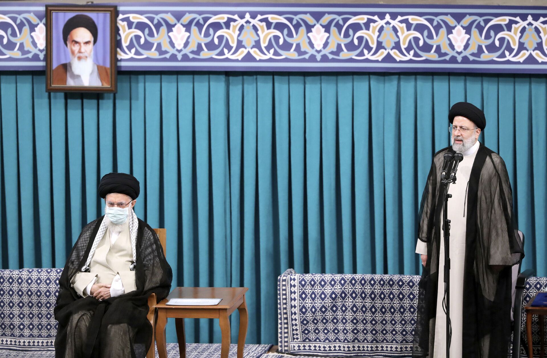 In this photo released by an official website of the office of the Iranian supreme leader, newly elected President Ebrahim Raisi, right, speaks after receiving official seal of approval of Supreme Leader Ayatollah Ali Khamenei, left, in an endorsement ceremony in Tehran, Iran, Tuesday, Aug. 3, 2021. - Sputnik International, 1920, 07.09.2021