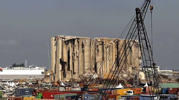 A general view shows the damaged grain silos at the port on 4 August 2021, as Lebanon marks a year since a cataclysmic explosion ravaged the capital Beirut. - Sputnik International