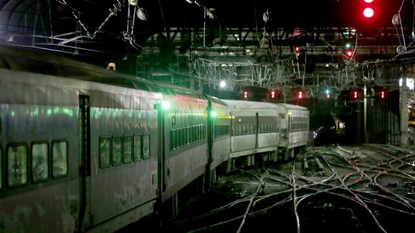 An Amtrak train moves through Penn Station in New York. - Sputnik International