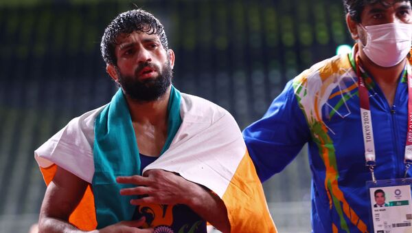 Ravi Kumar of India after winning in the semi-final at the Tokyo 2020 Olympics for the Wrestling (Freestyle) in the  Men's 57kg category. Makuhari Messe Hall A, Chiba, Japan on 4 August 2021. - Sputnik International