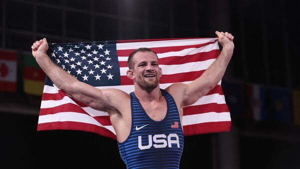 USA's David Morris Taylor Iii celebrates his gold medal victory against Iran's Hassan Yazdanicharati in their men's freestyle 86kg wrestling final match during the Tokyo 2020 Olympic Games at the Makuhari Messe in Tokyo on August 5, 2021.  - Sputnik International