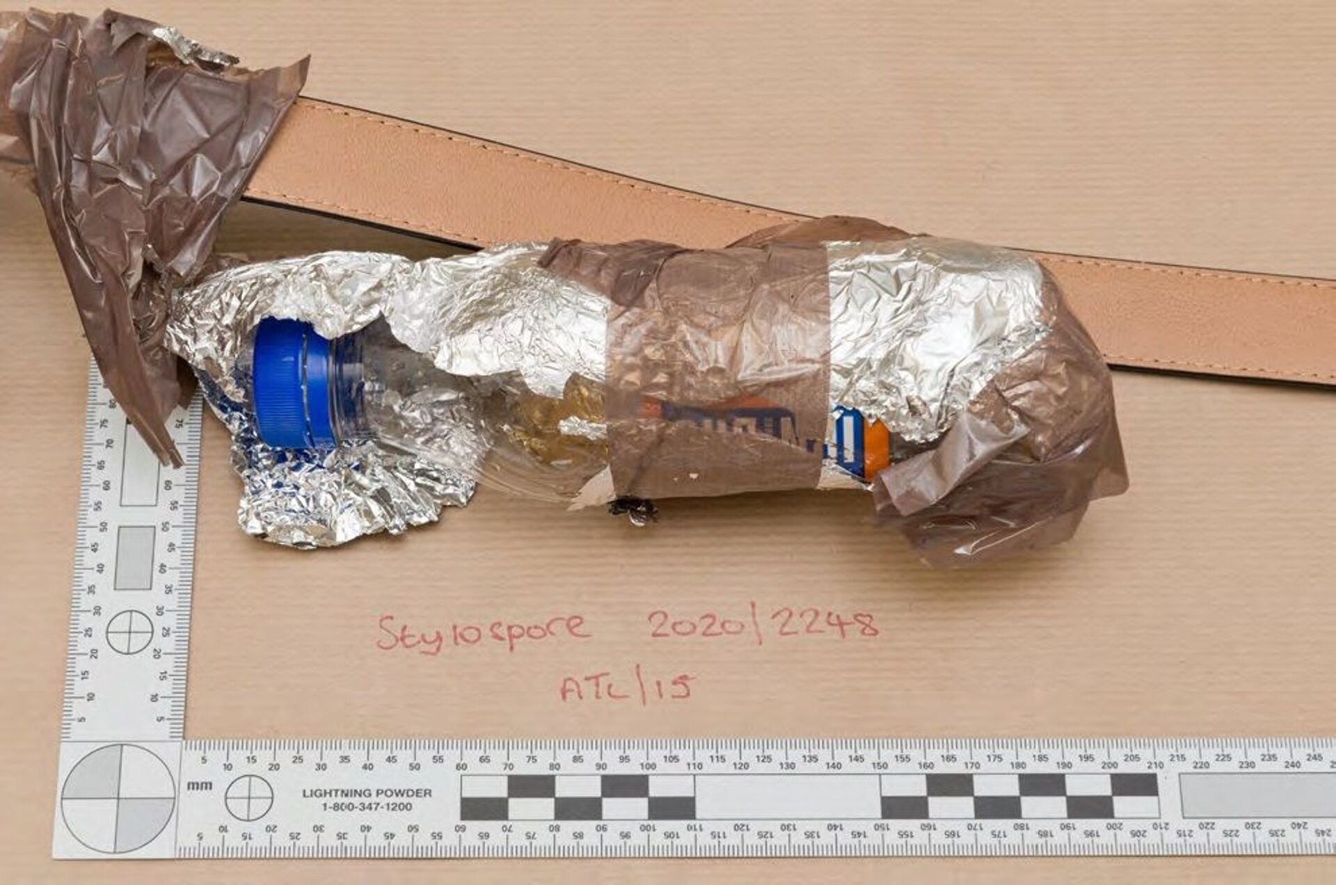One of the Irn Bru bottles which was wrapped in foil as part of the fake suicide belt - Sputnik International, 1920, 07.09.2021