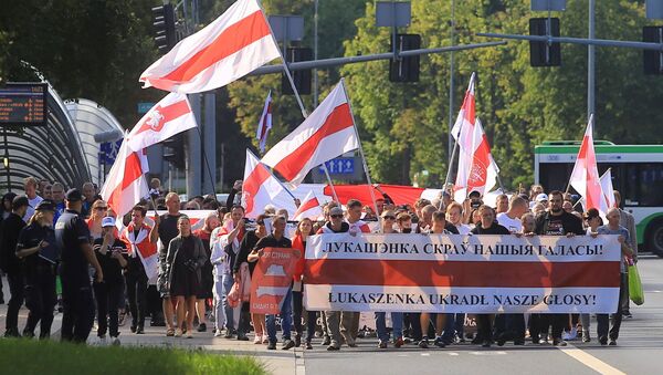 People march at the Global Solidarity Event for Belarus protest in Bialystok, Poland August 8, 2021 - Sputnik International