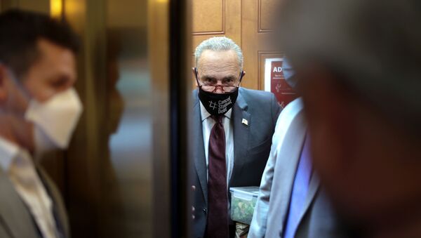 U.S. Senate Majority Leader Chuck Schumer (D-NY) departs the Senate at lunchtime, after morning remarks on the a $1 trillion bipartisan infrastructure bill at the U.S. Capitol in Washington, U.S. August 9, 2021. - Sputnik International