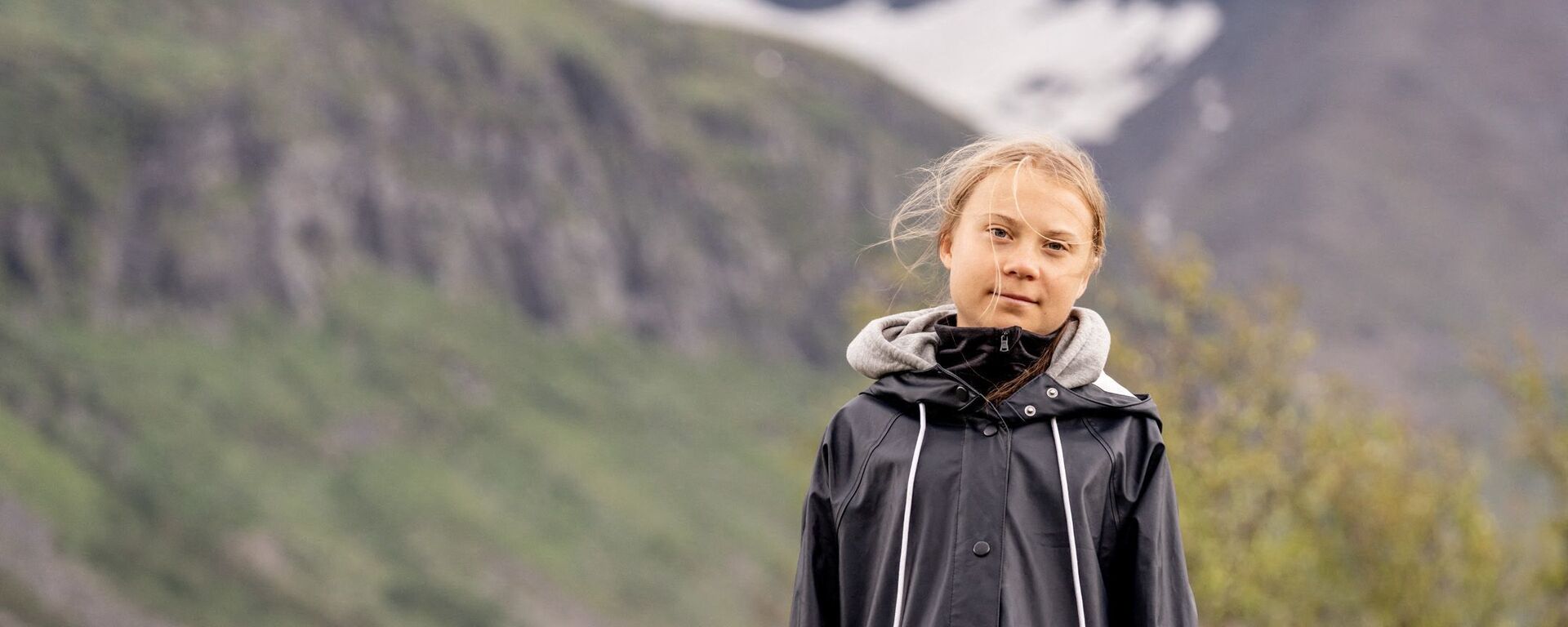 Swedish climate activist Greta Thunberg poses for a photo by the Ahkka mountain at the world heritage site of the Laponia area in Sapmi on July 13, 2021. - Sputnik International, 1920, 10.08.2021