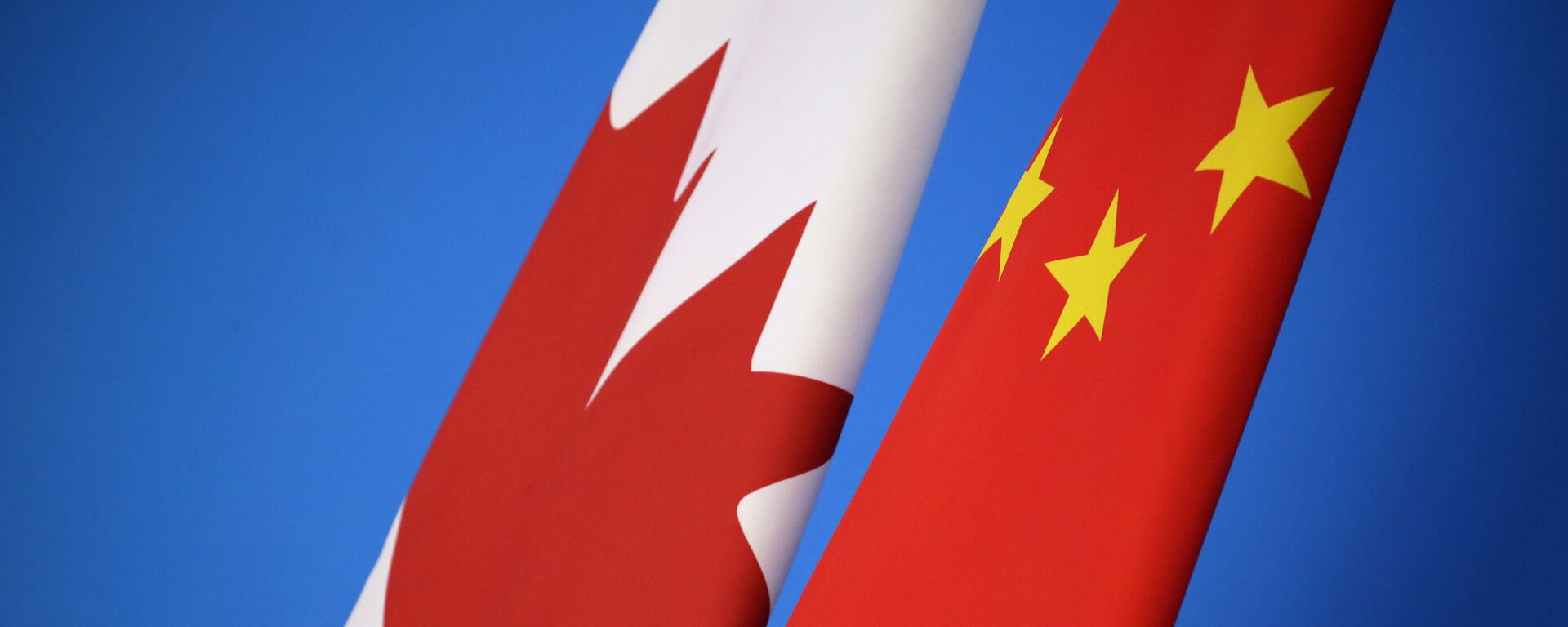 In this Nov. 12, 2018, file photo, flags of Canada and China are placed for the first China-Canada economic and financial strategy dialogue in Beijing, China.  - Sputnik International, 1920, 08.09.2023