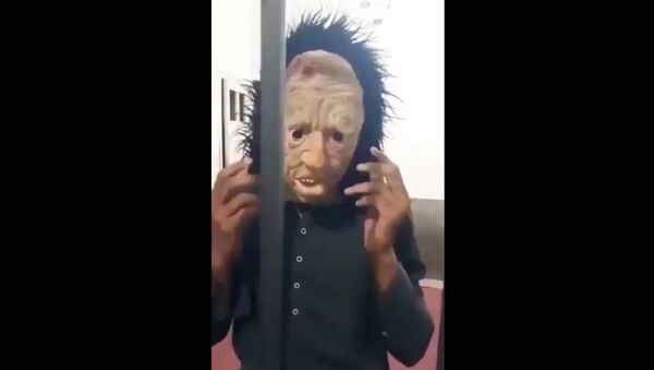 This guy arrested in Peshawar, had plans to celebrate independence day by scaring people. Apparently, the police wasn't much impressed, he was caught in his scary mask - Sputnik International