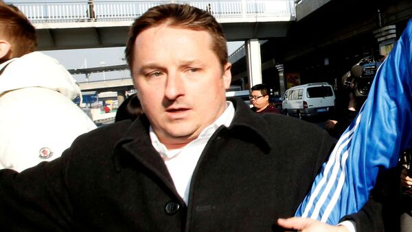 FILE PHOTO: Canadian businessman Michael Spavor arrives next to the former NBA basketball player Dennis Rodman (not pictured) after a trip to North Korea, at Beijing Capital International Airport, Beijing, China January 13, 2014 - Sputnik International