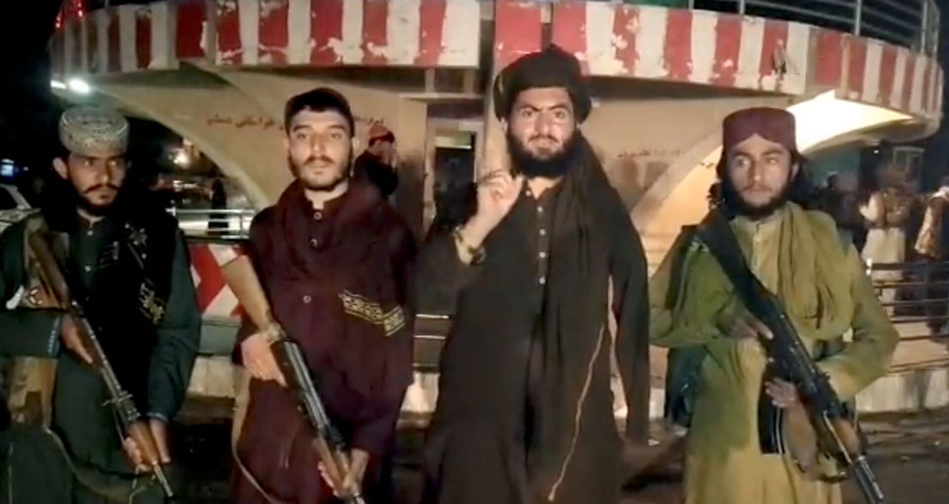 Taliban fighters record a message after seizing Pul-e- Khumri, capital of Baghlan province, Afghanistan, in this still image taken from a social media video, uploaded August 10, 2021 - Sputnik International, 1920, 07.09.2021