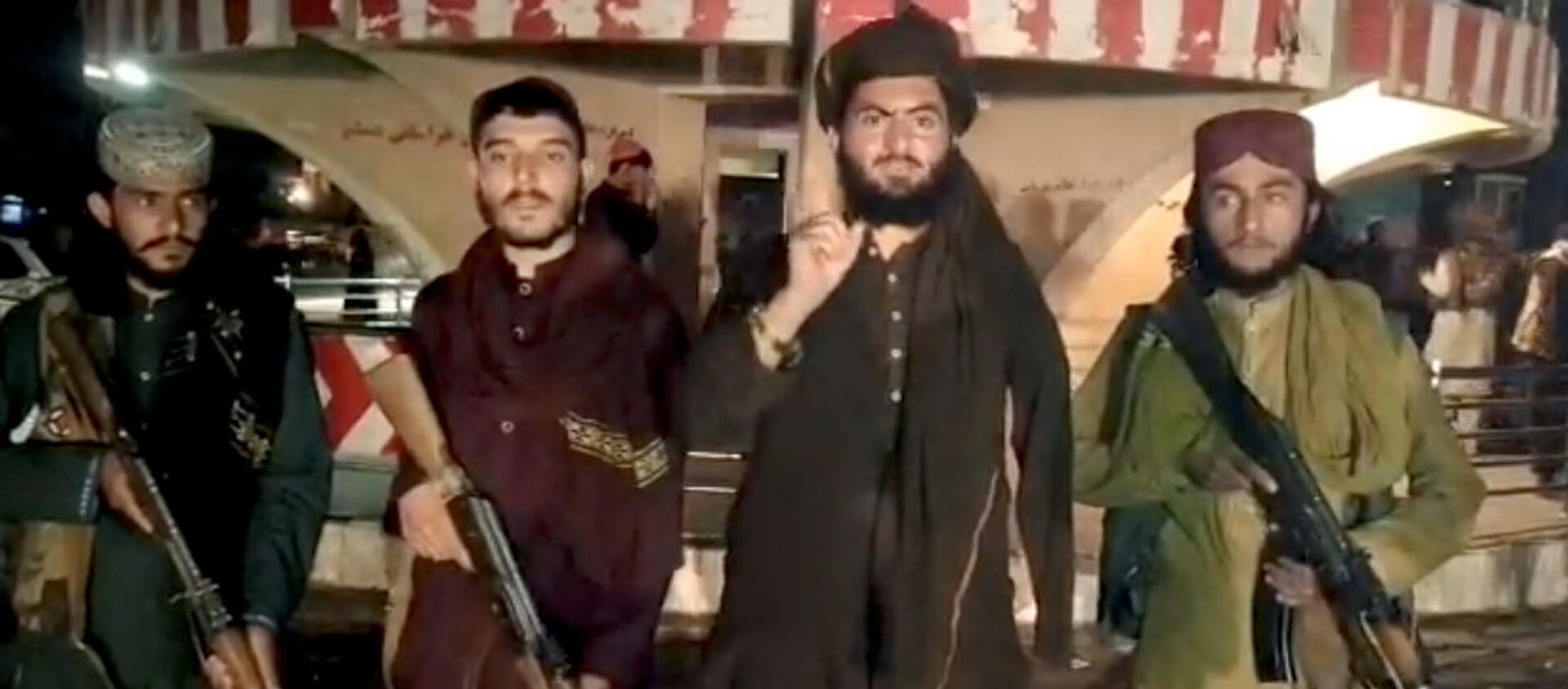 Taliban fighters record a message after seizing Pul-e- Khumri, capital of Baghlan province, Afghanistan, in this still image taken from a social media video, uploaded August 10, 2021 - Sputnik International, 1920, 12.08.2021