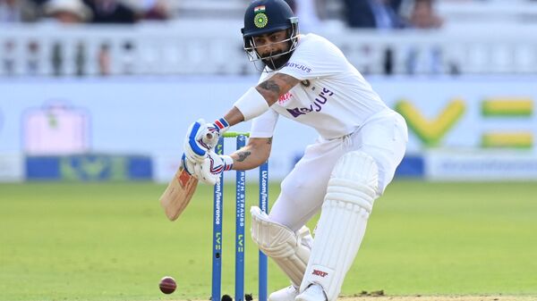 India's captain Virat Kohli plays a shot on the first day of the second cricket Test match  between England and India at Lord's cricket ground in London on August 12, 2021.  - Sputnik International