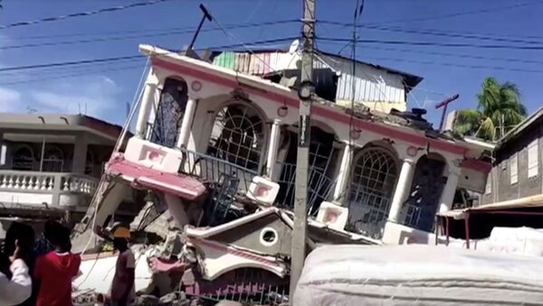 A view of a collapsed building following an earthquake, in Les Cayes, Haiti, in this still image taken from a video obtained by Reuters on August 14, 2021 - Sputnik International