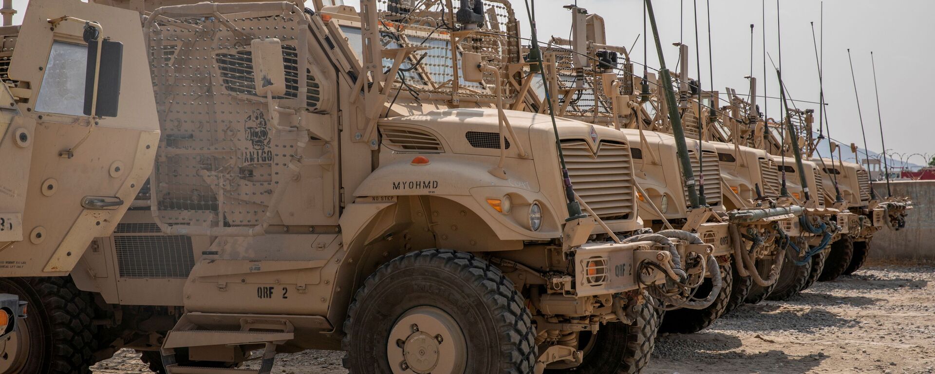 U.S. Army soldiers from the 10th Mountain Division and U.S. contractors prepare Mine Resistant Ambush Protected vehicles, MRAPs, to be transported off of base in support of the withdrawal mission in Kandahar, Afghanistan, August 21, 2020. Picture taken August 21, 2020. U.S. Army/Sgt. Jeffery J. Harris - Sputnik International, 1920, 09.09.2021