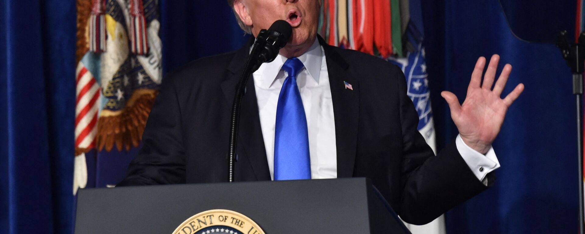 US President Donald Trump speaks during his address to the nation from Joint Base Myer-Henderson Hall in Arlington, Virginia, on August 21, 2017. - Trump Monday left the door open to a possible political agreement with the Taliban, in an address to the nation on America's strategy in the 16-year Afghan conflict. Some day, after an effective military effort, perhaps it will be possible to have a political sentiment that includes elements of the Taliban in Afghanistan, he said. - Sputnik International, 1920, 09.10.2021