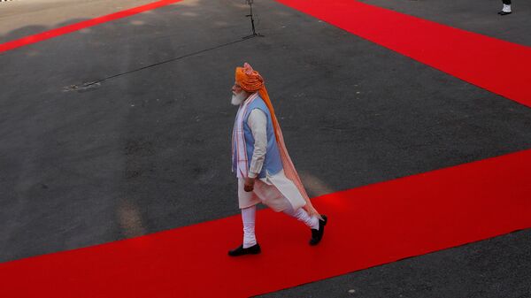 Indian Prime Minister Narendra Modi walks after inspecting the honour guard during Independence Day celebrations at the historic Red Fort in Delhi, India, August 15, 2021.  - Sputnik International