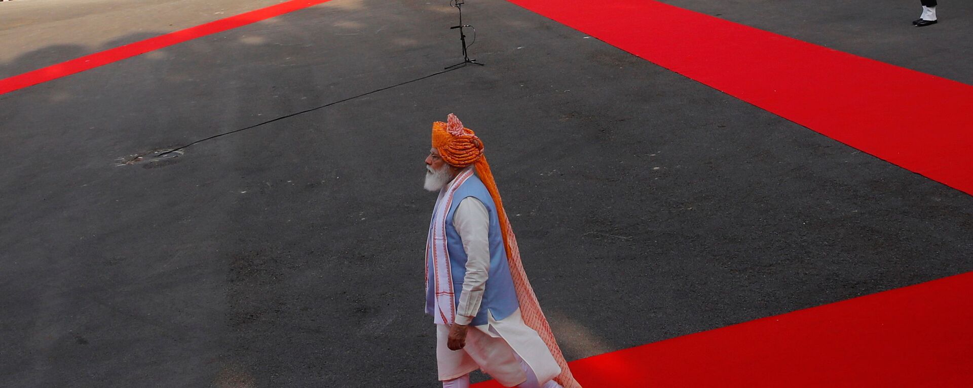 Indian Prime Minister Narendra Modi walks after inspecting the honour guard during Independence Day celebrations at the historic Red Fort in Delhi, India, August 15, 2021.  - Sputnik International, 1920, 24.08.2021