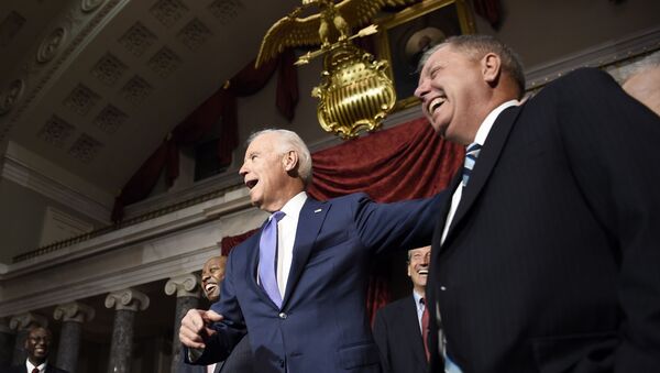 Vice President Joe Biden shares a laugh with Sen. Lindsey Graham, R-S.C., right, following a ceremonial swearing-in ceremony for Sen. Tim Scott, D-S.C., left, Tuesday, Dec. 2, 2014, in the Old Senate Chamber on Capitol Hill in Washington. Rep. Mark Sanford, R-S.C., is second from right - Sputnik International