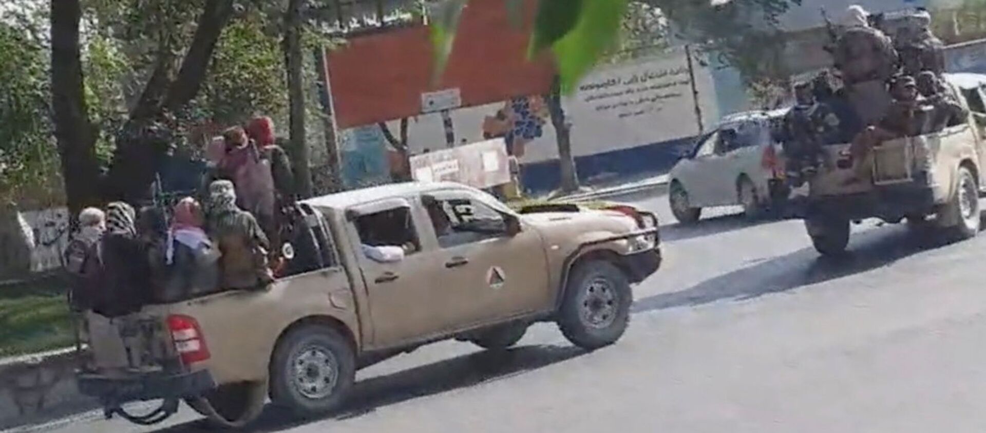 Taliban drive through the streets of Kabul, Afghanistan August 16, 2021 in this still image taken from social media video.  - Sputnik International, 1920, 16.08.2021