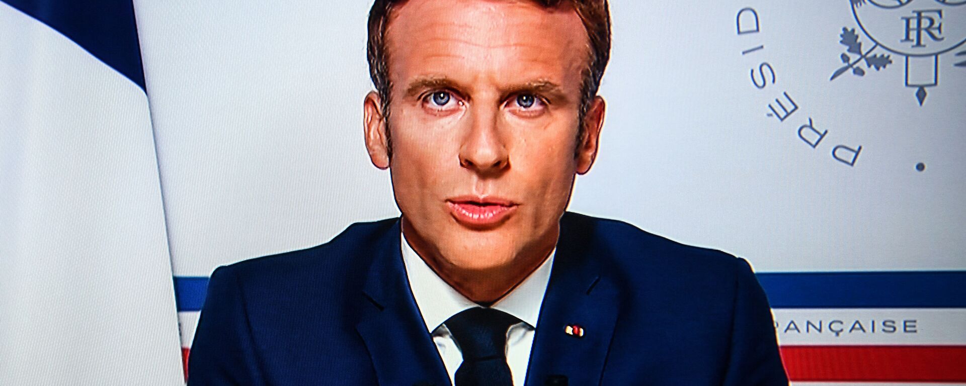 An image shot in Paris off a television screen shows French President Emmanuel Macron speaking on the situation in Afghanistan, from the Fort de Bregancon presidential summer residence at Bormes-les-Mimosas, southeastern France on August 16, 2021 - Sputnik International, 1920, 09.01.2022