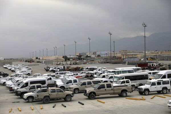 In this 5 July 2021 file photo, vehicles are parked at Bagram Airfield after the American military left the base, in Parwan province north of Kabul, Afghanistan.  - Sputnik International
