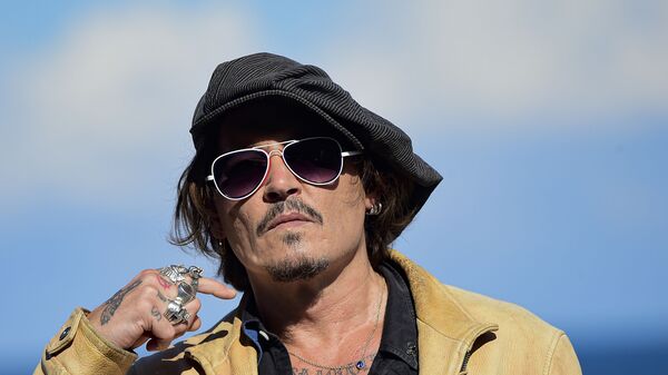 In this file photo dated Sunday, Sept. 20, 2020, US actor and film producer Johnny Deep during the photocall for his film Crock of Gold: A Few Rounds with Shane Macgoman at the 68th San Sebastian Film Festival, in San Sebastian, northern Spain - Sputnik International